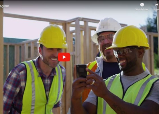 3 Builders making a live instagram post